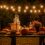 Festive Texas backyard Halloween party setup with spooky appetizers and drinks, boozy Halloween recipes for parties.