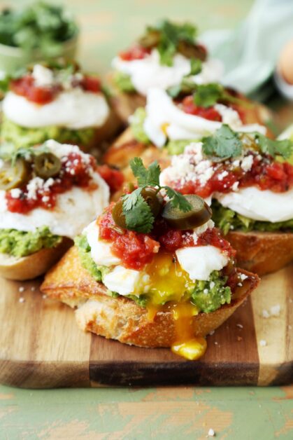 tex-mex avocado toast on cutting board