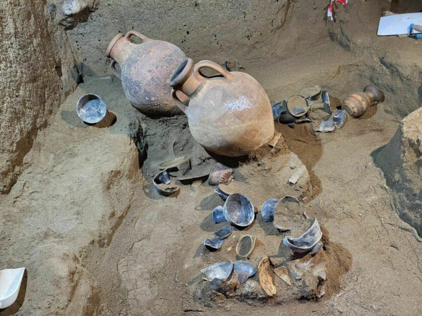 Etruscan amphorae and pottery uncovered in tomb