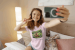 Woman wears pink vegan chicken salad t shirt