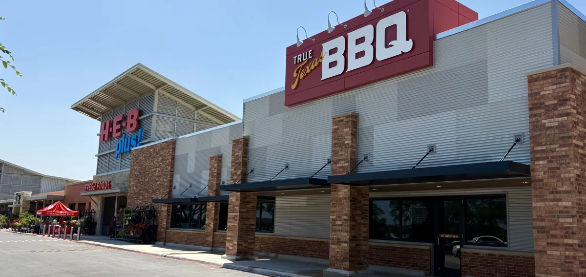 Facade of HEB Plus and True Texas BBQ location in Spring Branch, Texas